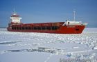 Image of The Week: A Cargo Ship on The Frozen Gulf of Bothnia – Finland