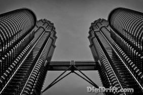A black and white image of Malaysia's Petronas Towers